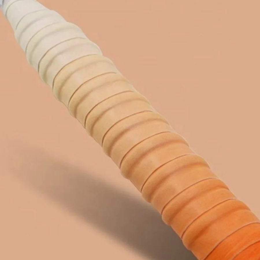 OG-DB01 orange gradient dragon-bone overgrip on a racket handle