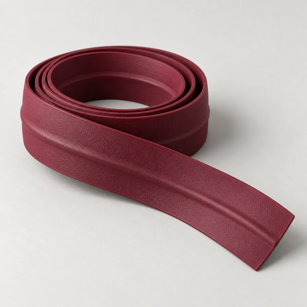Illustrative burgundy ribbed badminton grip strip