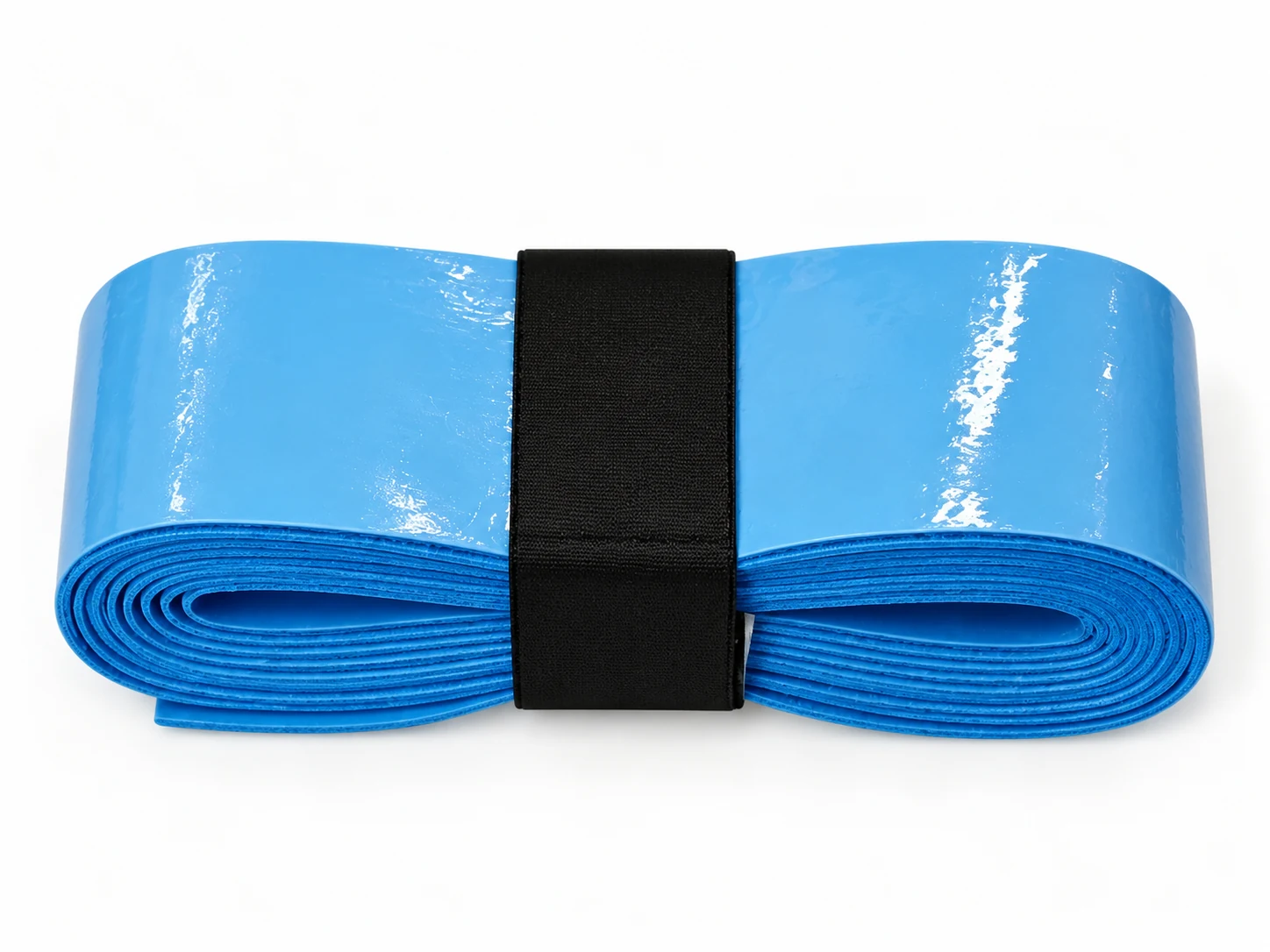 Rotolo di overgrip morbido, elastico e aderente blu OG-T07 disposto in piano