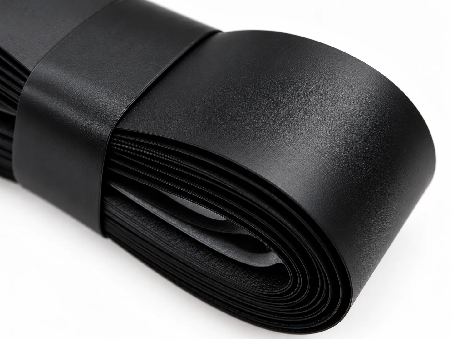 Primo piano della superficie e del bordo del rotolo di grip di ricambio comfort nero RG-C01