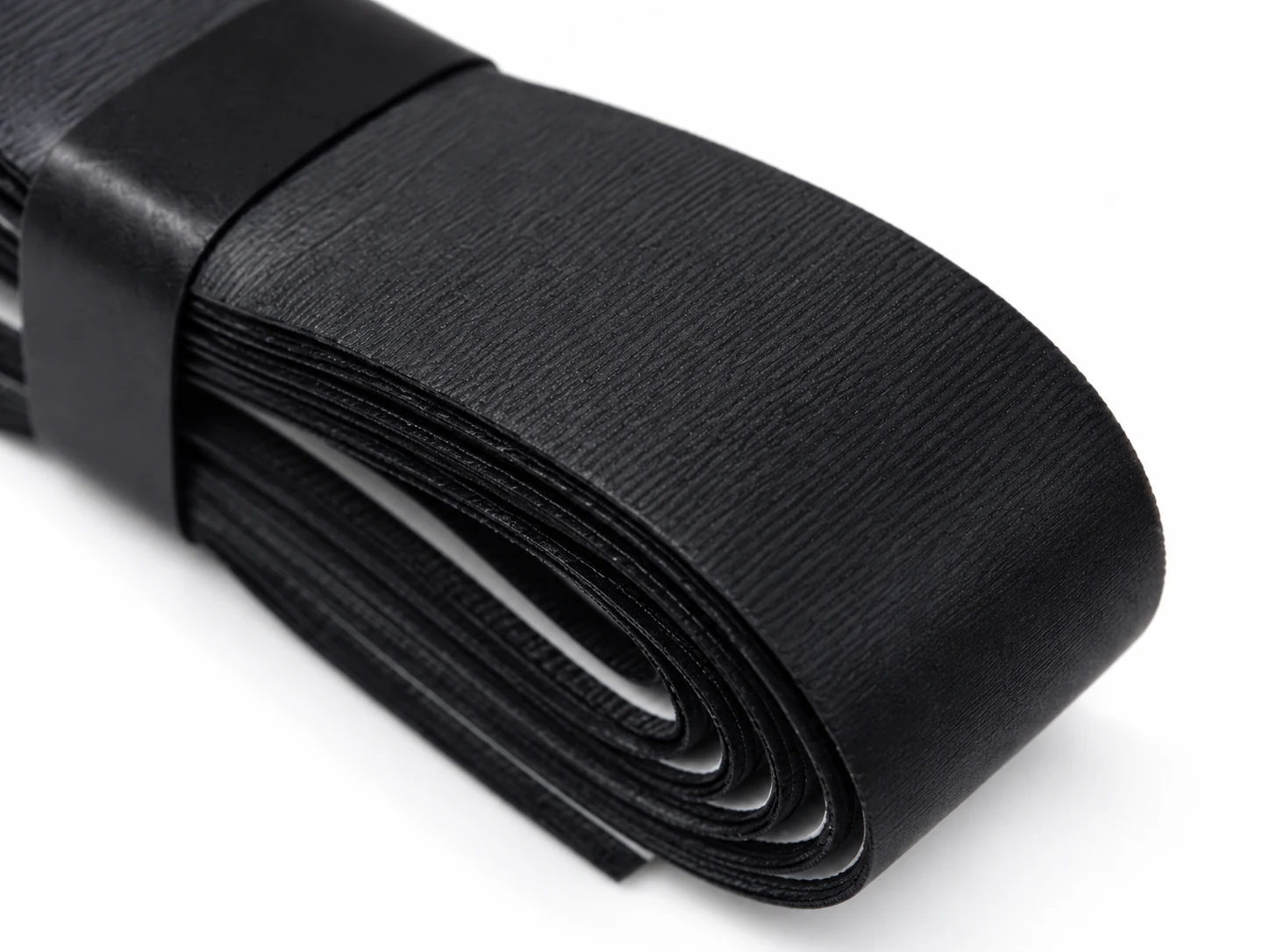 Close-up of the RG-C02 black comfort replacement grip surface and roll edge