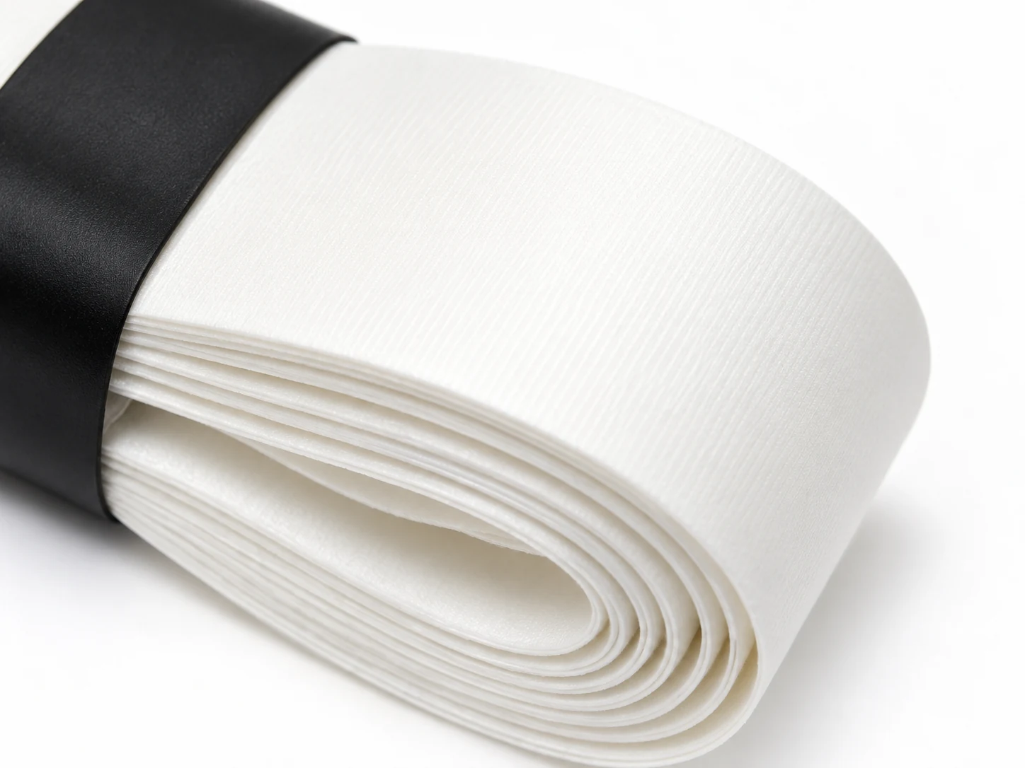 Close-up of the RG-S01 white soft replacement grip surface and roll edge