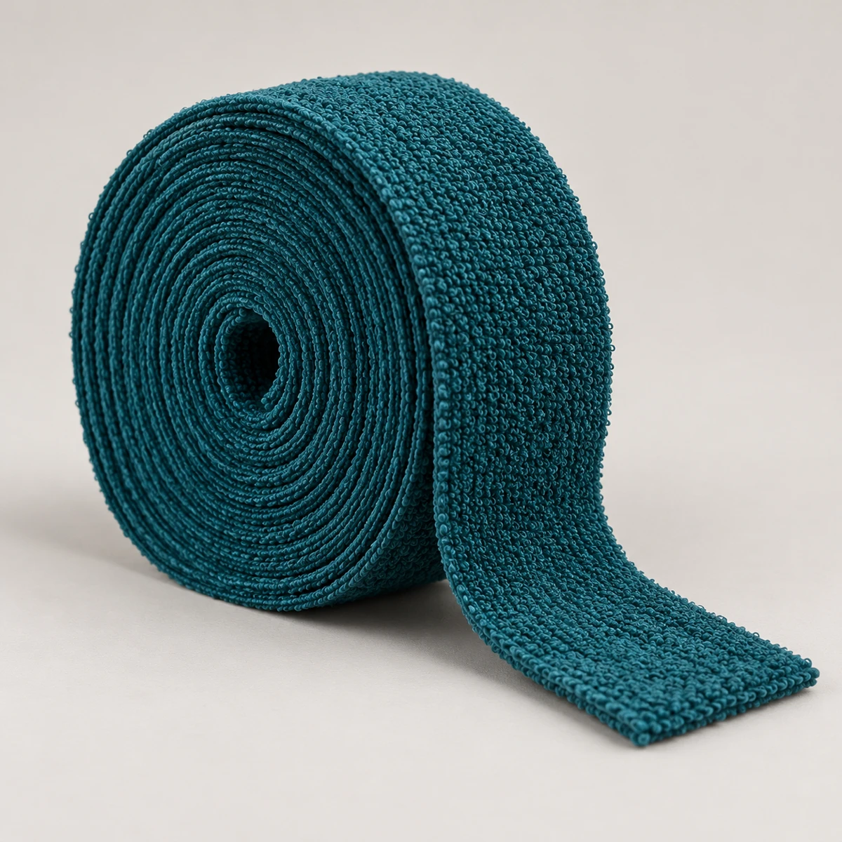 Illustrative teal towel grip roll